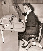 1956 Miss Bernice Bieganski with electric typewriter Detroit MI OM.jpg (156216 bytes)